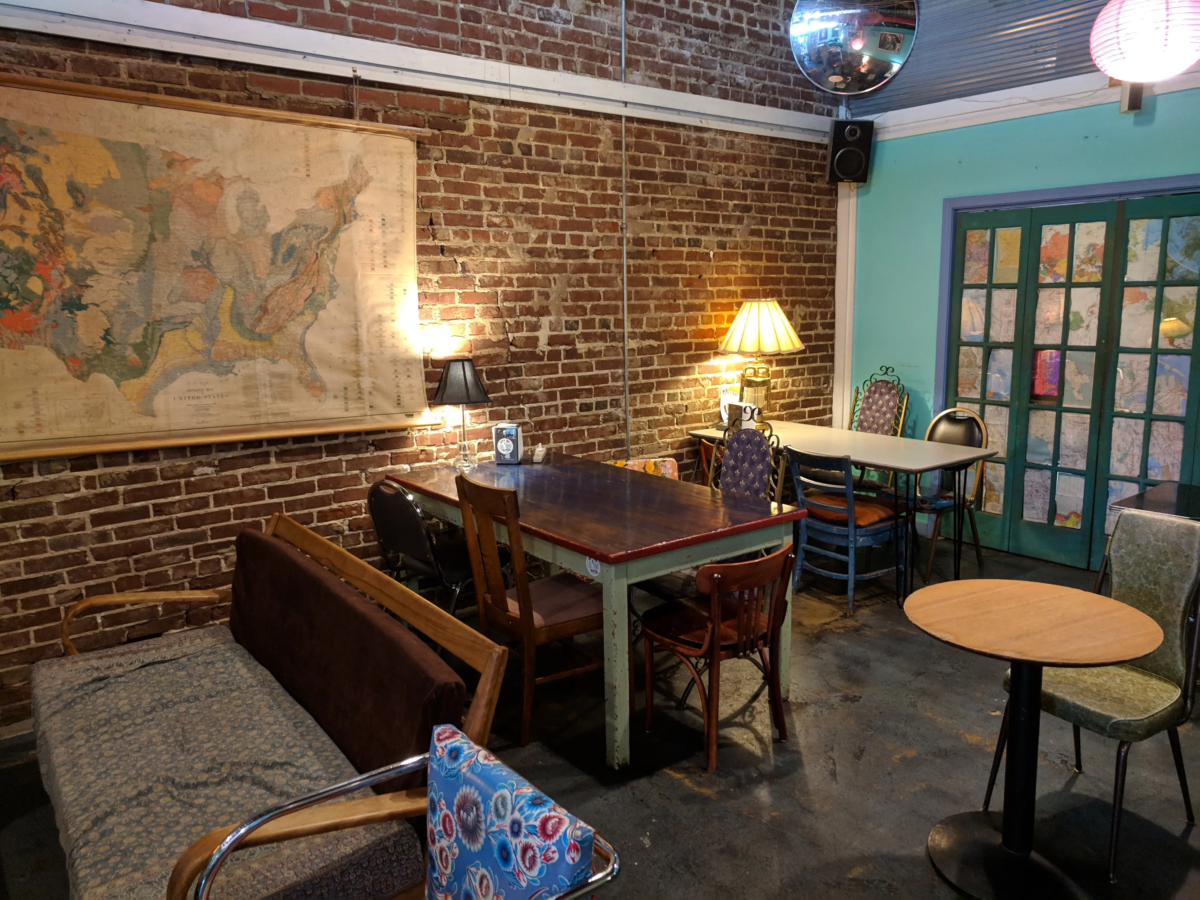 Private event guests socializing inside Otherlands Coffee Bar in Memphis